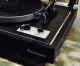 This turntable is manual but has an auto-lift function, so the tonearm lifts up at the end of the record.   Comes with a Denon DL-160 high-output moving coil cartridge.  Because it is high-output, there is no need for a special moving coil phono preamp.